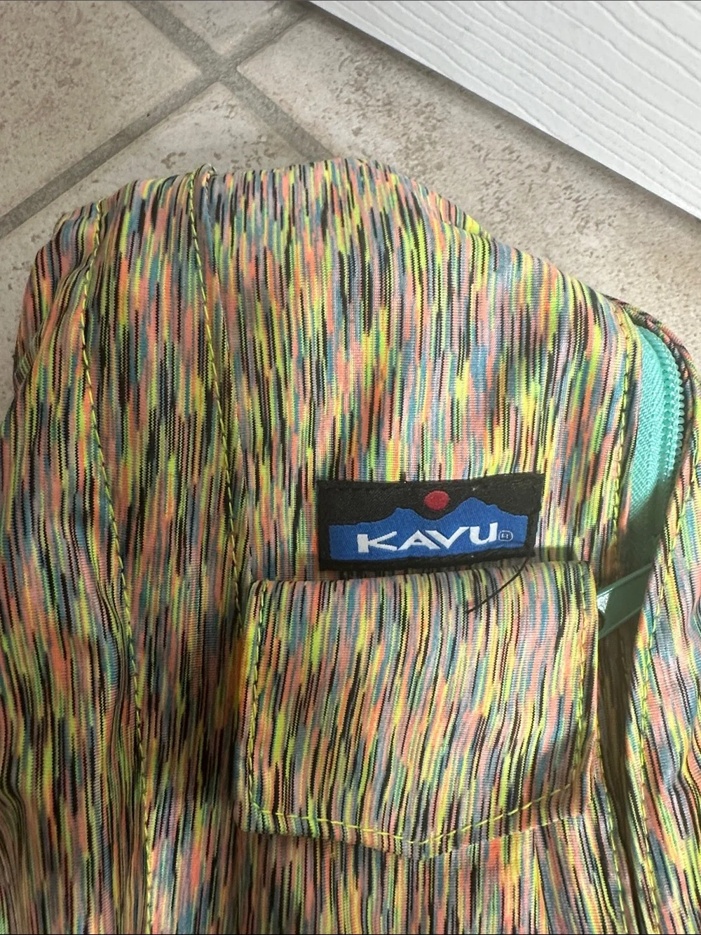 Kavu Multicolor Rope Sling Backpack with Teal Zipper